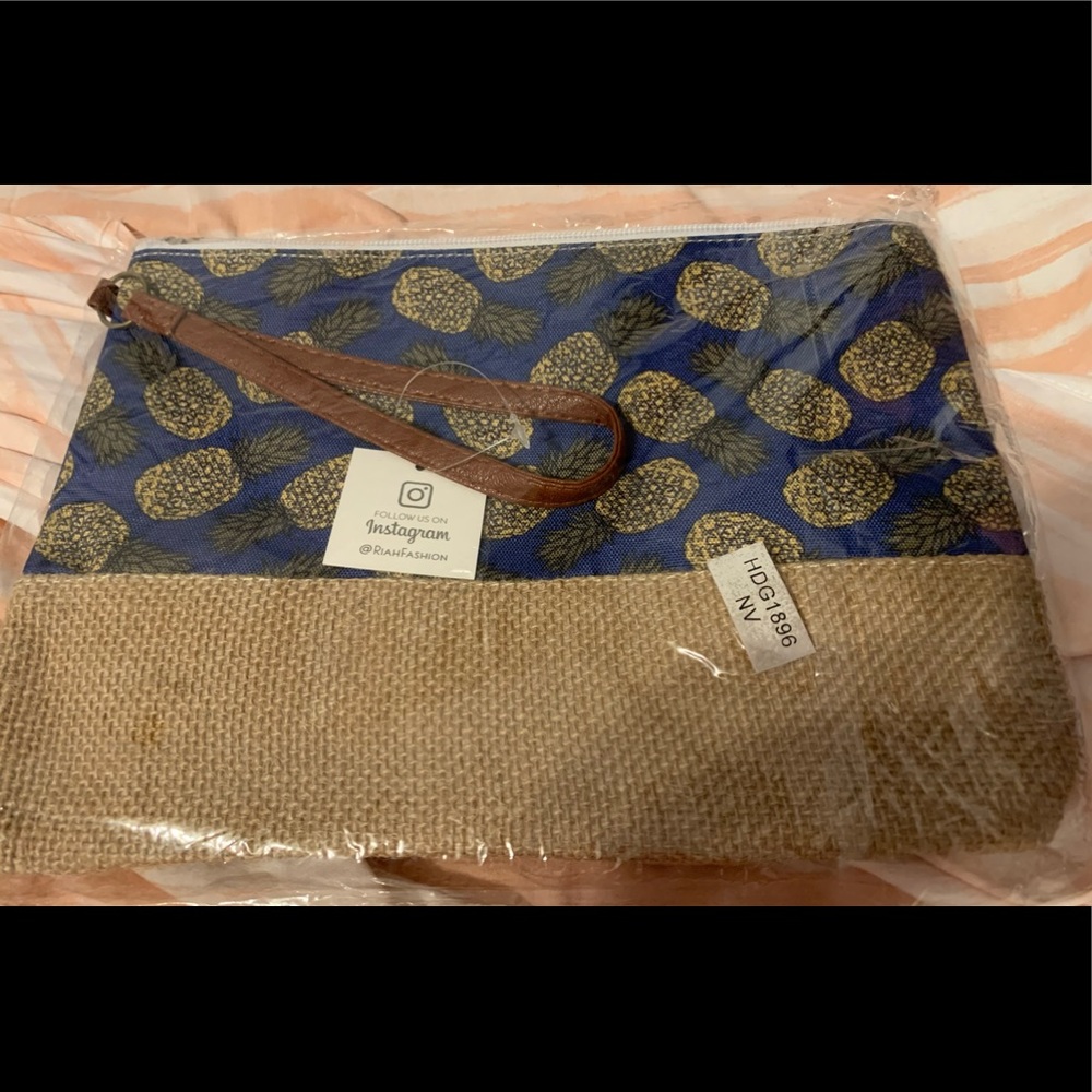 Riah Fashions blue pineapple cosmetics bag